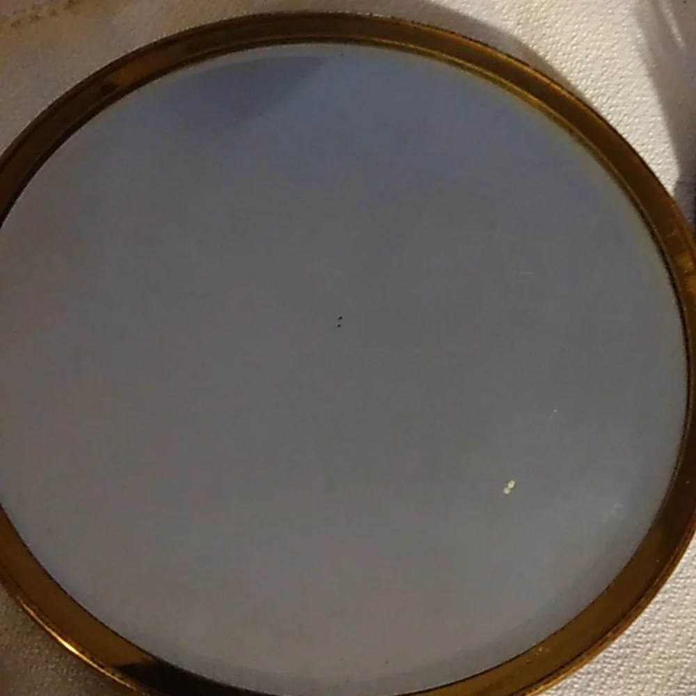 Vintage vanity mirror and hairbrush